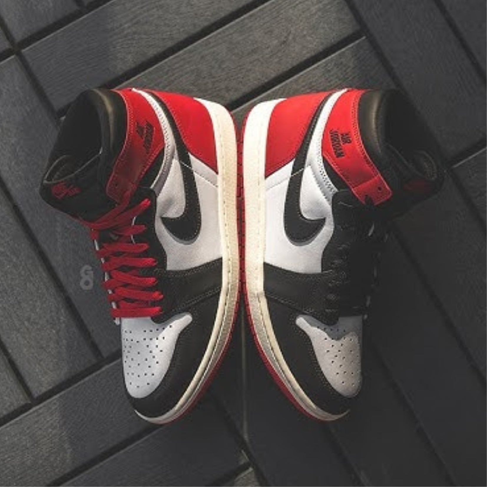 JORDAN 1 HIGH ‘BLACK TOE REIMAGINED’